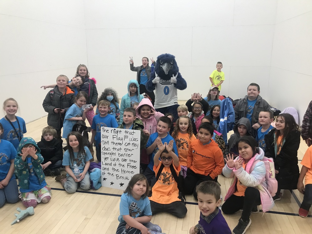 Rising Raptors After School Program performs at USU-E basketball game